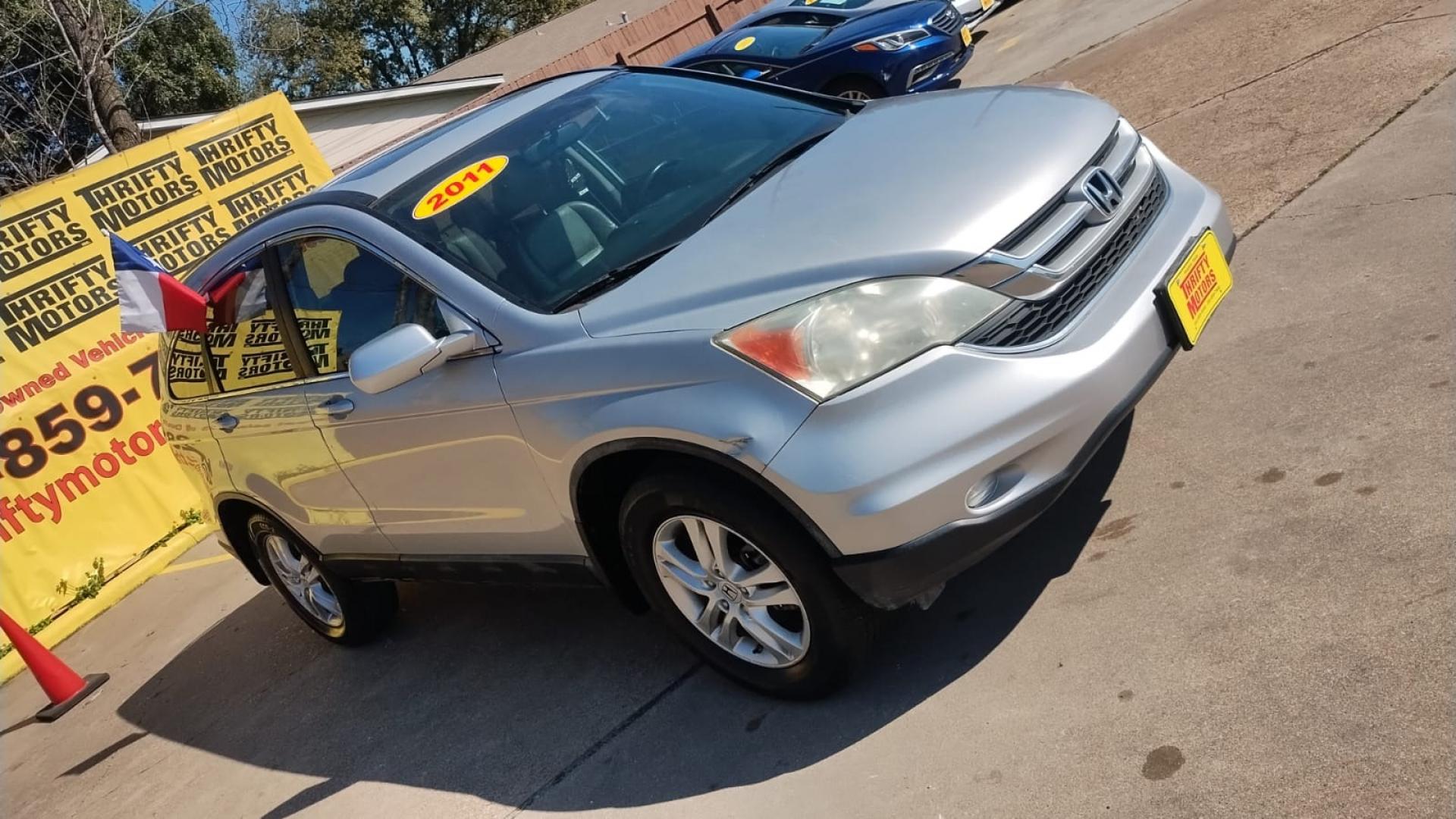 2011 Honda CR-V (5J6RE3H73BL) , located at 16710 Clay Rd., Houston, TX, 77084, (281) 859-7900, 29.834864, -95.656166 - Photo#2